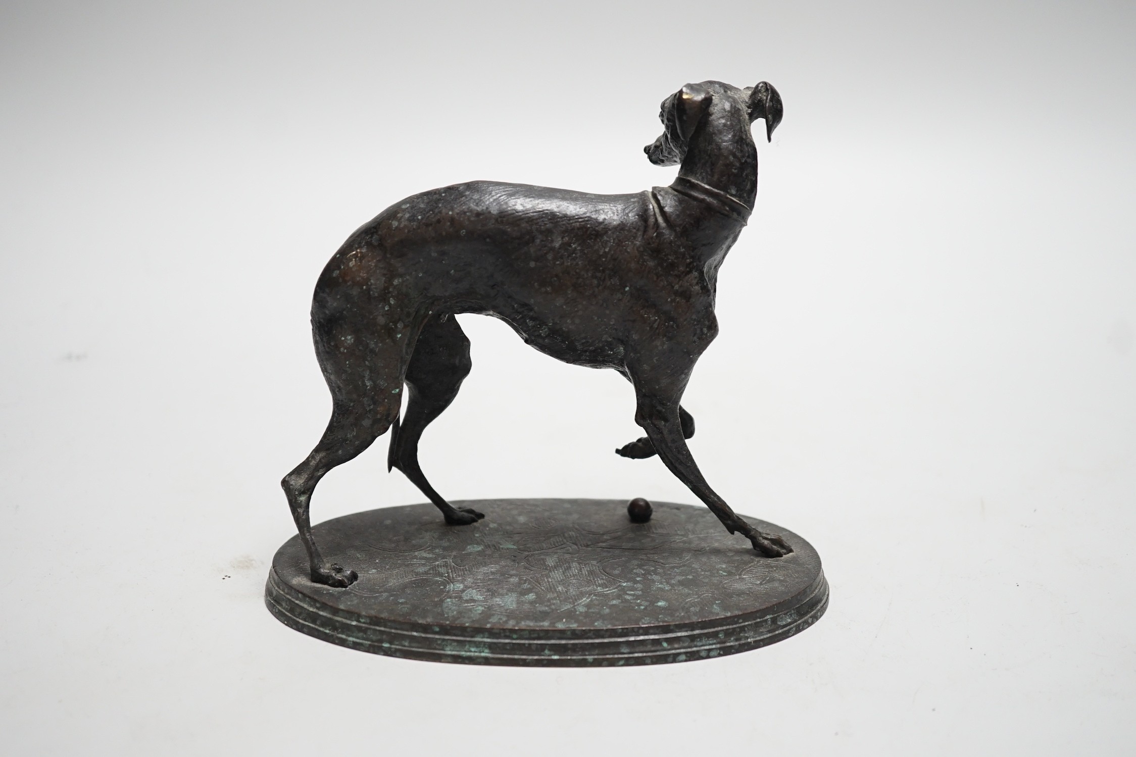 After Pierre-Jules Mene, A bronze study of a whippet, signed to underside, 17cm wide, 15cm high